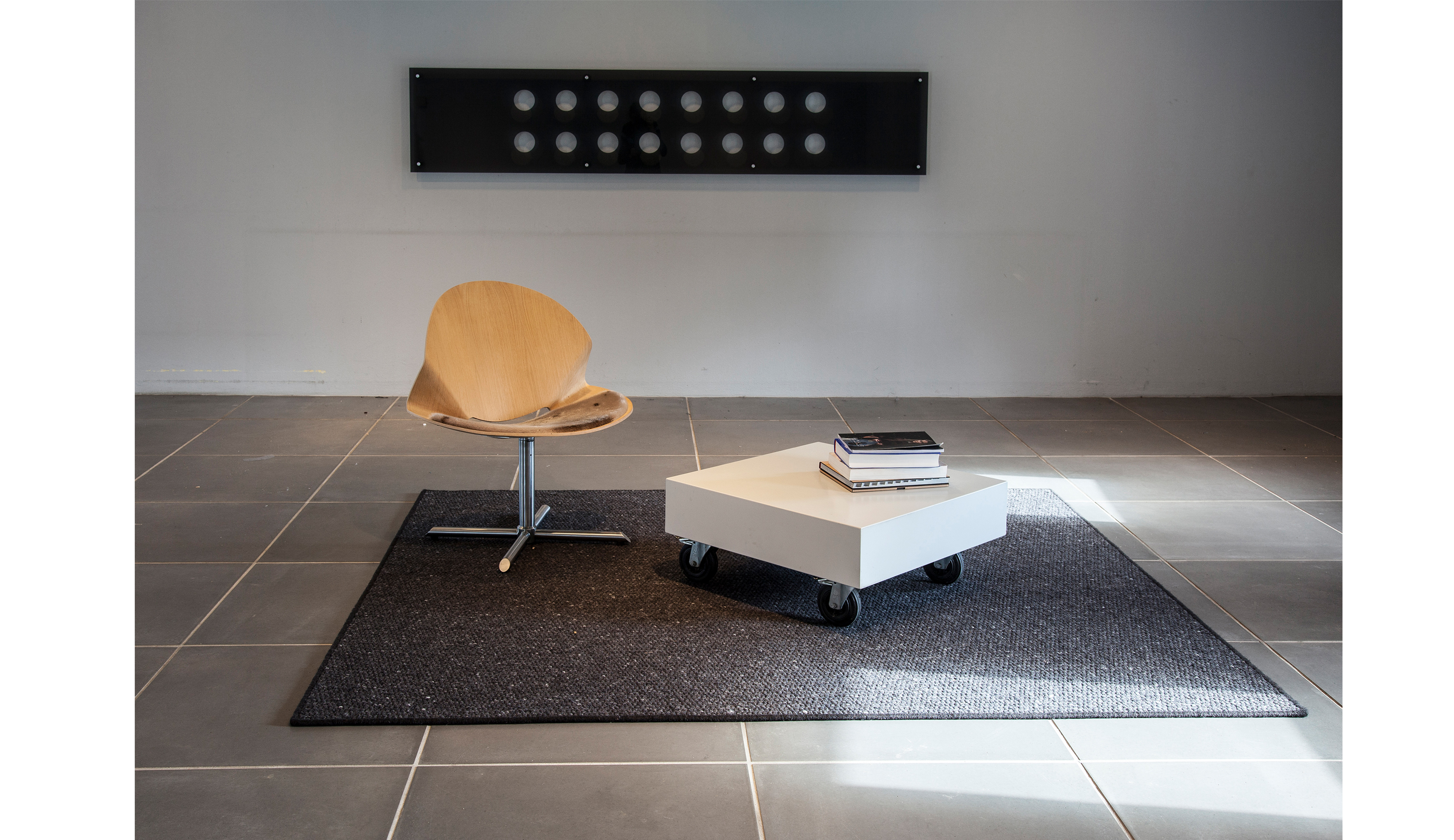 Mellana afpasset uldtæppe i stue